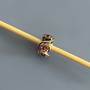 Chamilia sterling silver retired Forever bead with light pink CZ stones.